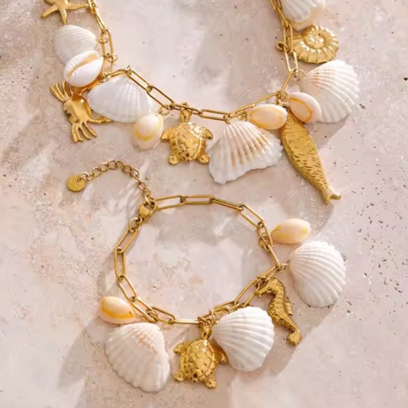 Anthropologie Jewelry - Summer trend adjustable Gold and White Shell Charm Bracelet